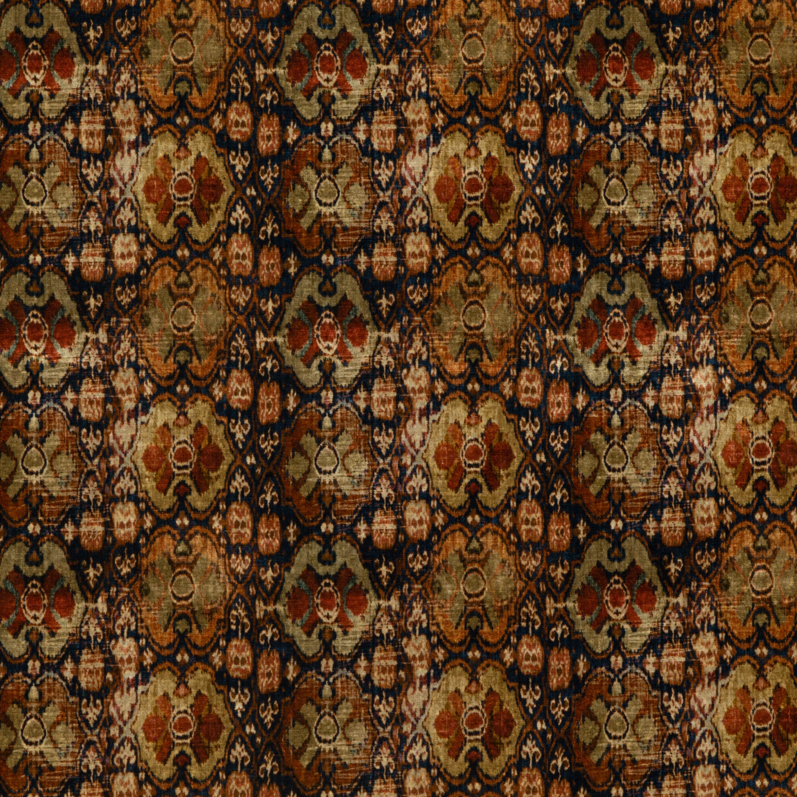 Rust sienna velvet with olive medallions, charcoal tracery and distressed woven texture