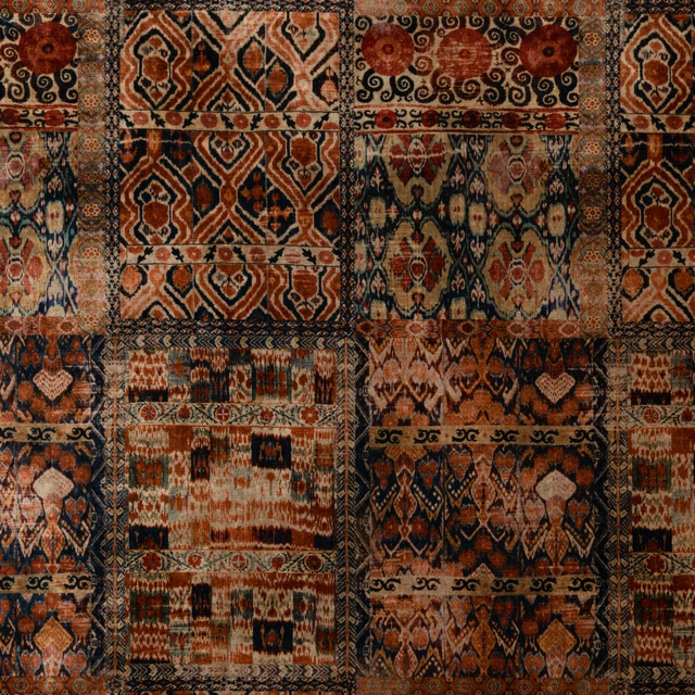 Sienna velvet patchwork in rust, charcoal, cream and muted teal with geometric motifs