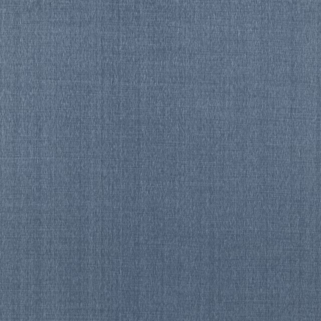 Close-up of muted denim-blue linen with a fine, softly slubbed woven texture