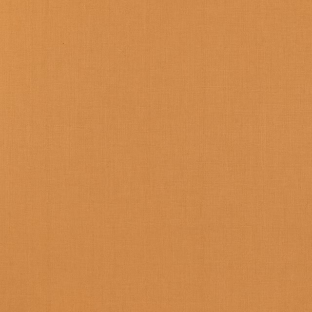 Warm ochre linen with a fine, subtly irregular plain weave