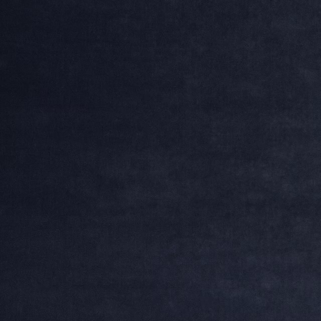 Inky navy velvet with a softly mottled pile and subtle blue shading