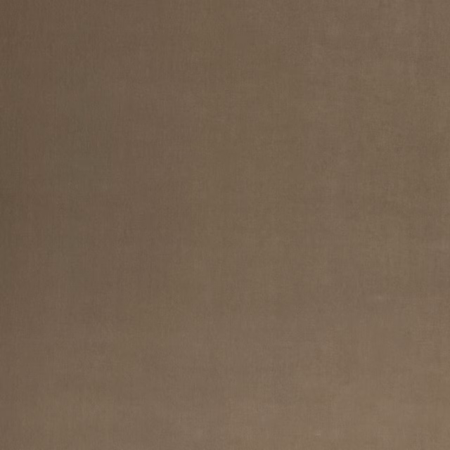Close view of muted taupe-grey velvet with a softly brushed, even surface