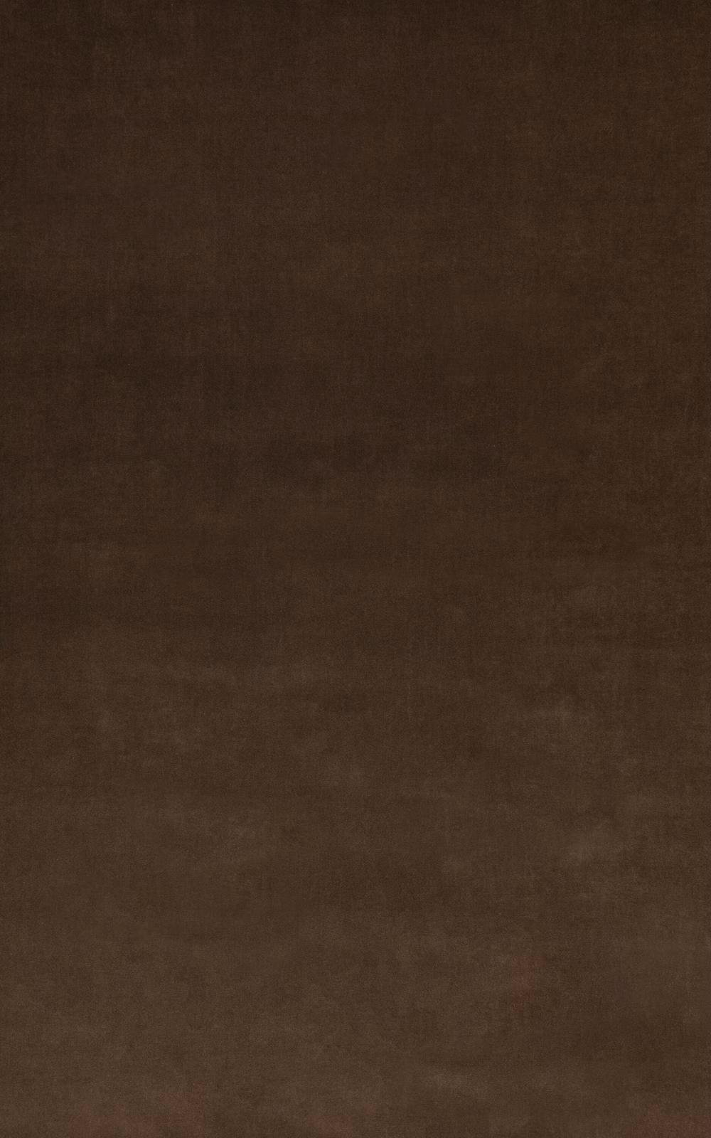 Deep ebony-brown velvet showing a soft, subtly directional pile and low sheen