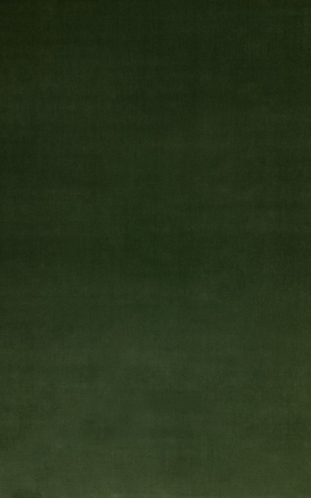Deep emerald velvet swatch with a softly shaded, low-sheen pile