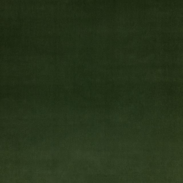 Deep emerald velvet swatch with a softly shaded, low-sheen pile