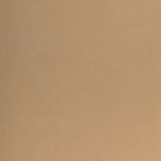 Warm parchment beige velvet showing subtle vertical nap shading across a plain surface