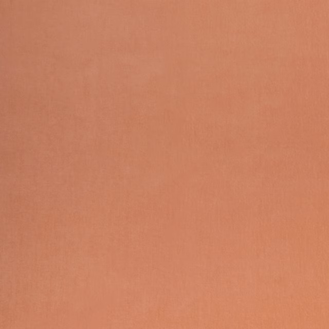 Dusty plaster-terracotta velvet showing a soft, subtly brushed plain surface