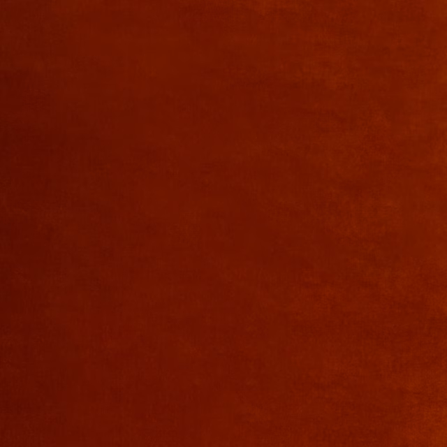 Deep spice-red velvet with a softly shaded, directional nap