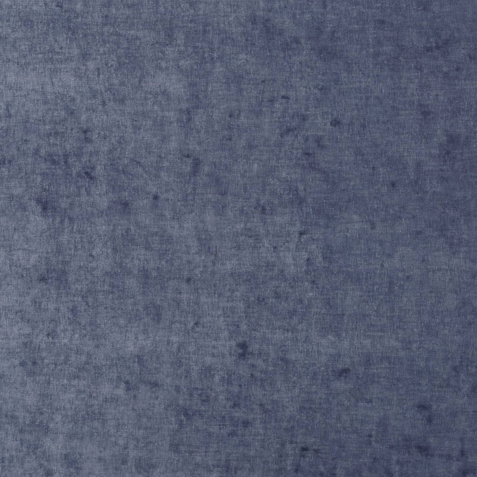 Mottled slate-blue velvet with soft cloudy shading and a low lustrous pile