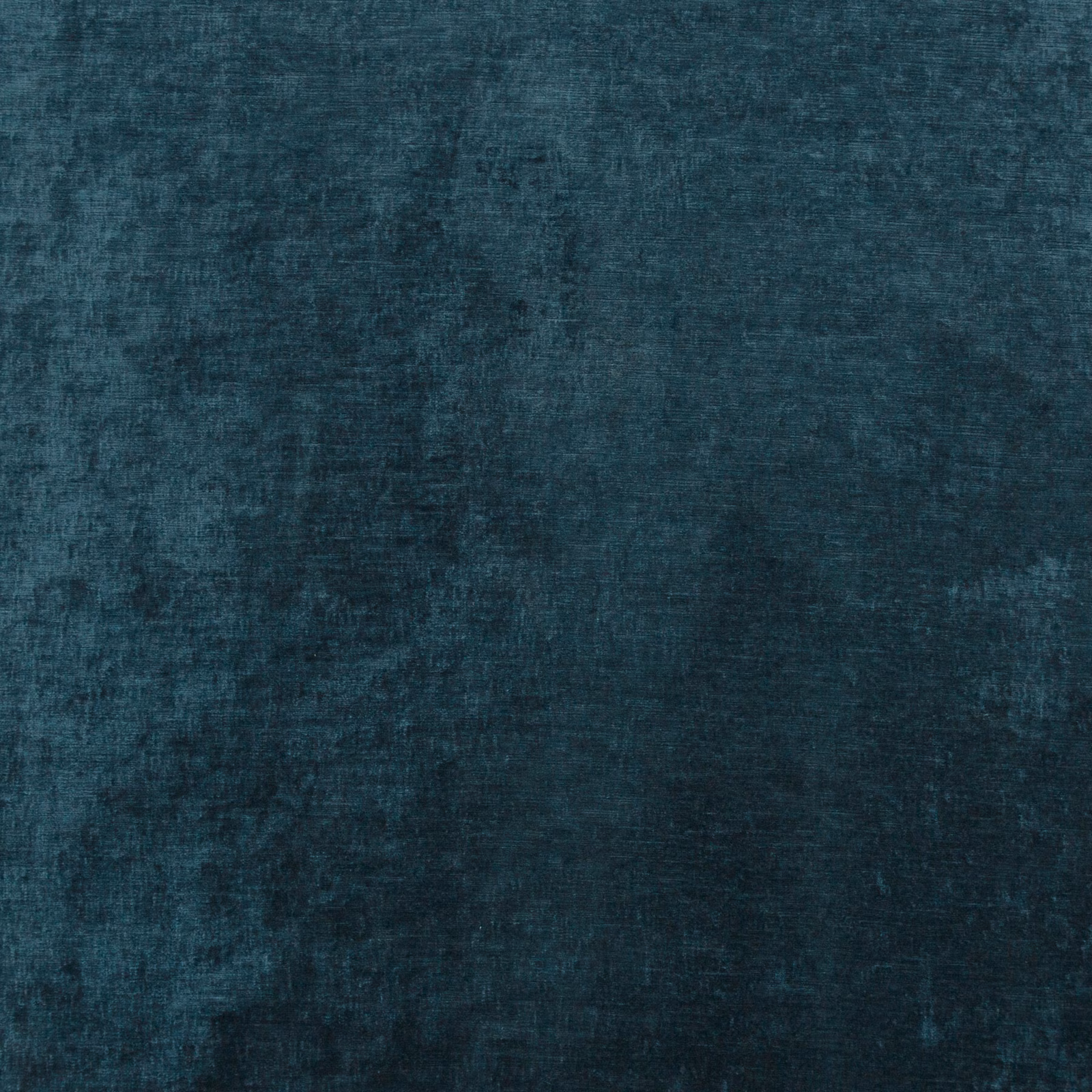 Deep teal-indigo velvet with a softly mottled, light-catching pile