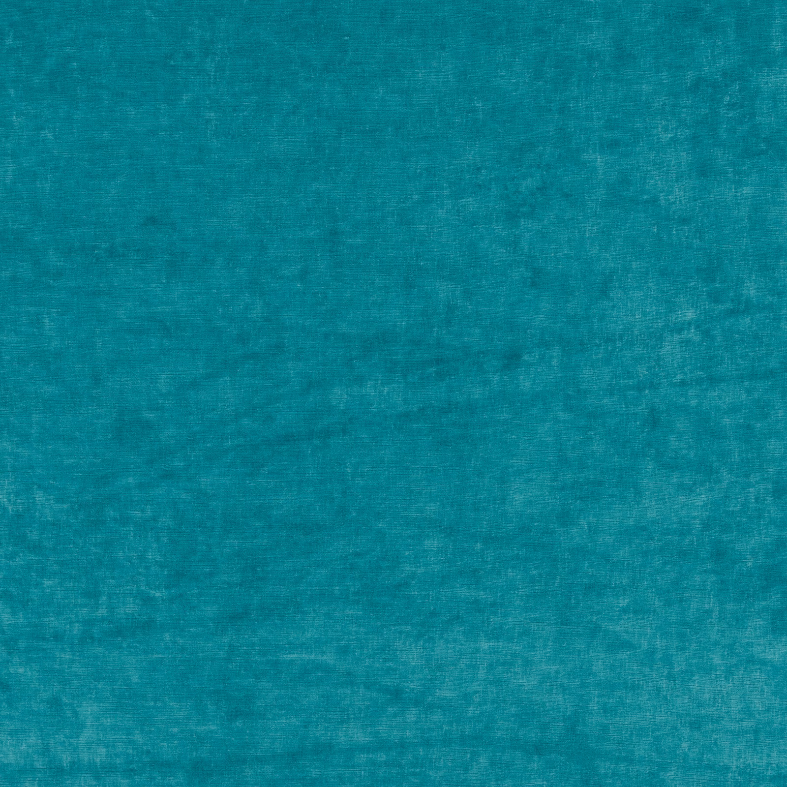 Saturated peacock teal velvet with softly mottled nap and subtle directional sheen