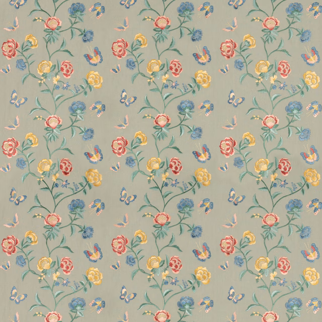 Muted aqua floral fabric with coral, yellow and blue blossoms on branching stems