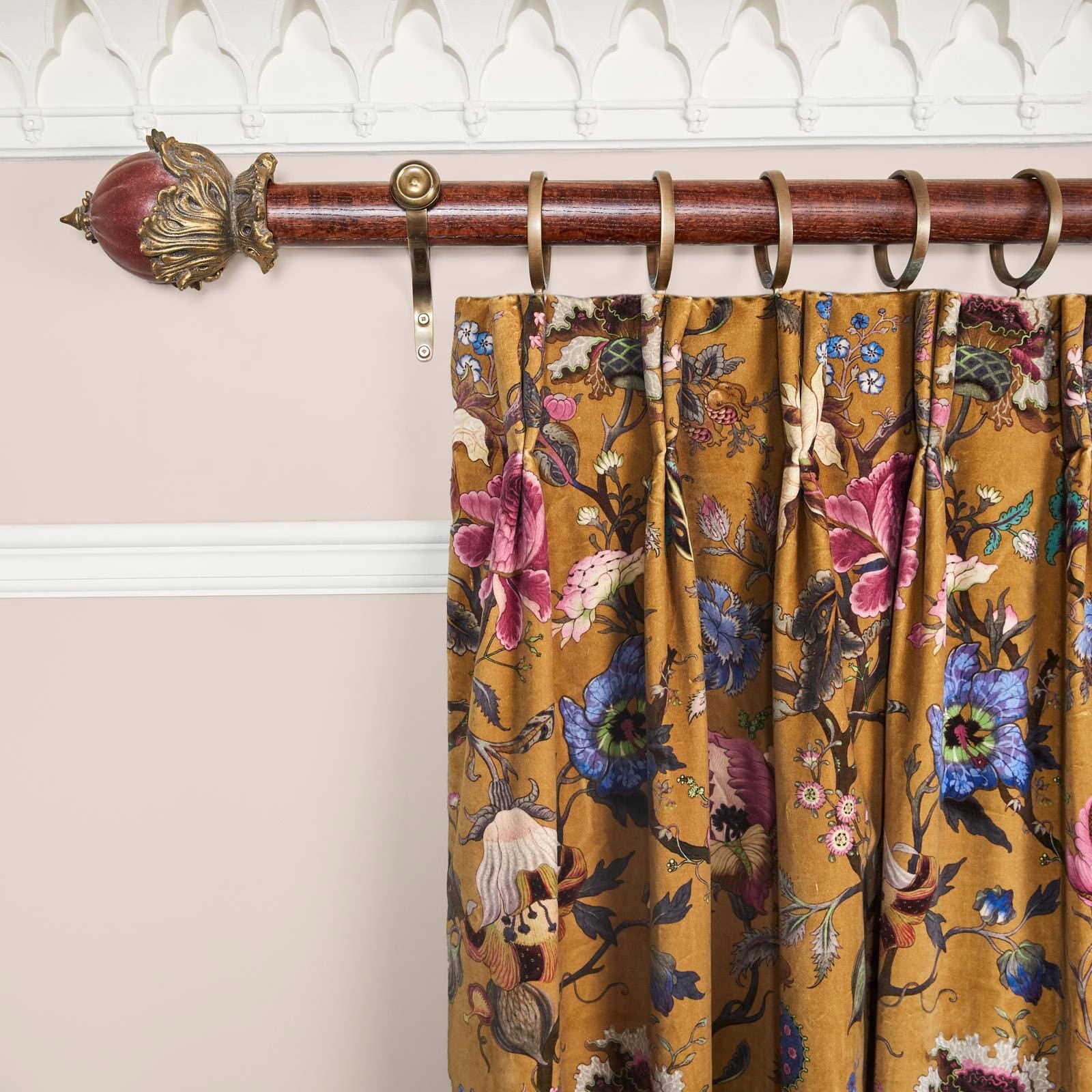 Gathered bronze velvet curtain with pink, blue and cream floral motifs