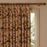 Dusty puce pink floral curtain with ochre blooms, dark foliage and deep pleats
