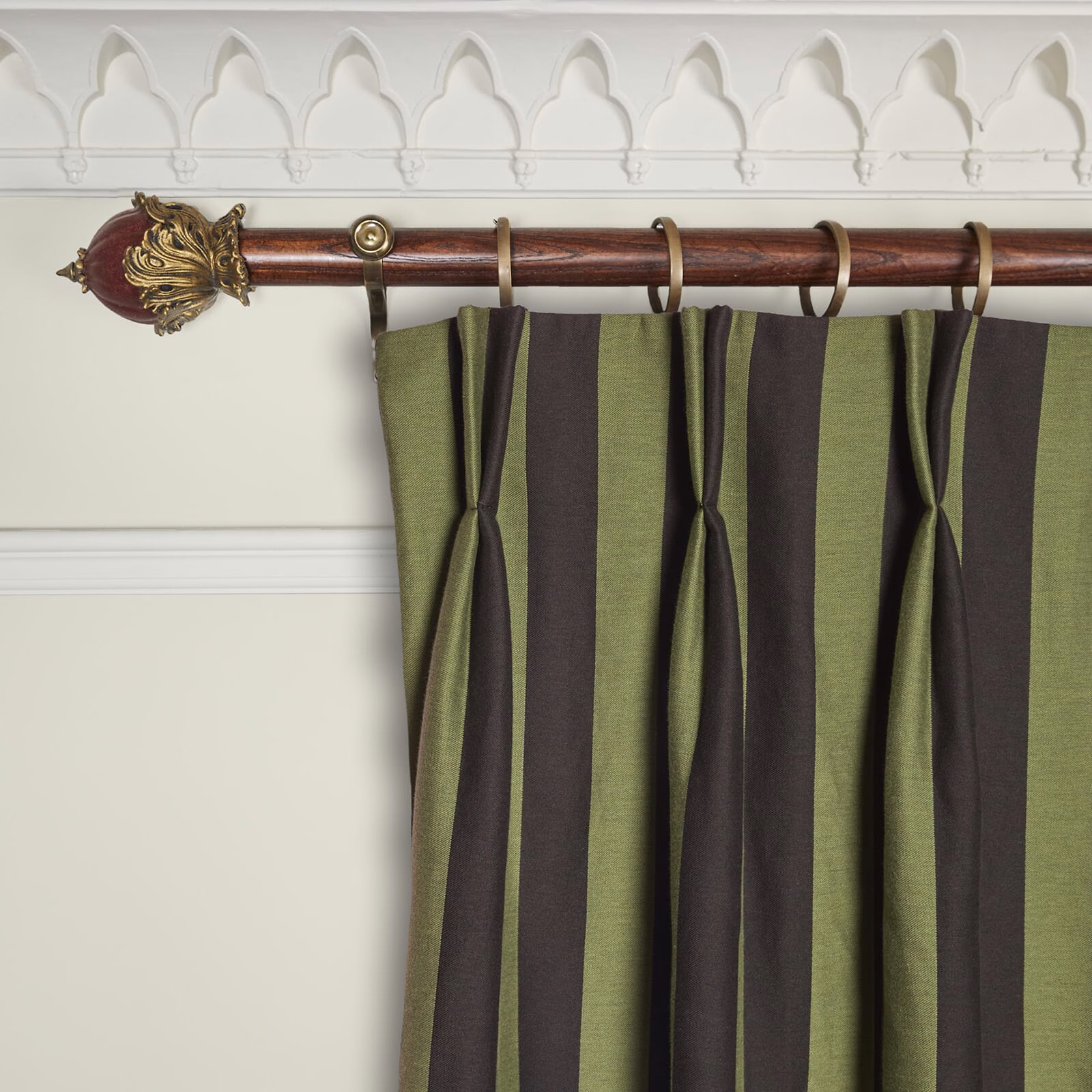 Muted olive and noir jacquard curtain with broad vertical stripes and subtle sheen