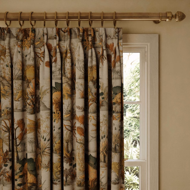 Dusk curtain with stone ground, rust dinosaurs and dense botanical foliage