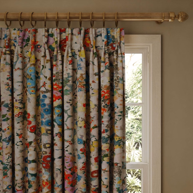Autumn velvet curtain with stone ground and vivid multicolour floral motifs