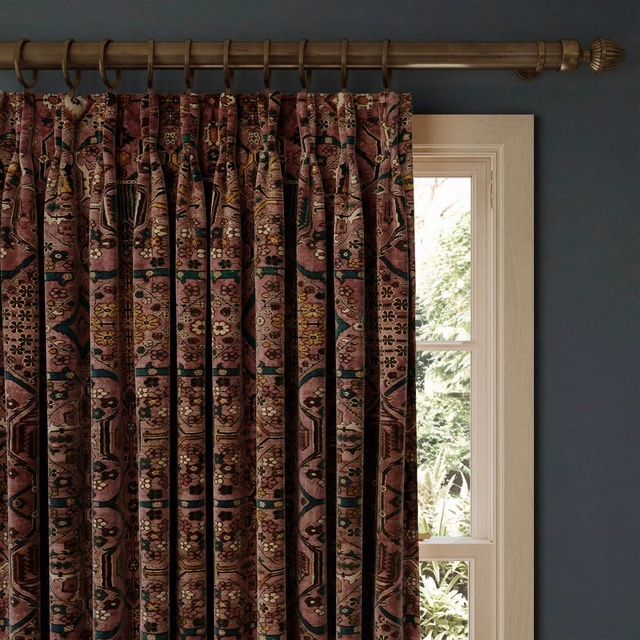 Blush velvet curtain with vertical floral medallions, burgundy, teal and ochre accents