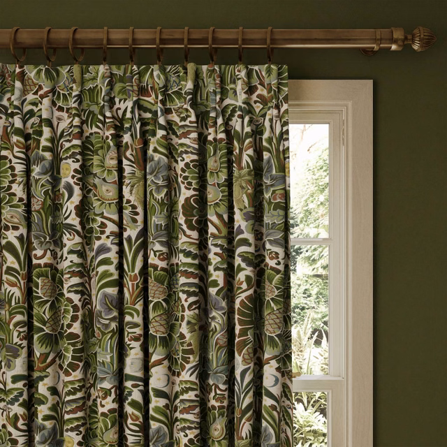 Moss green botanical curtain with cream ground, brown stems and muted blue flowers