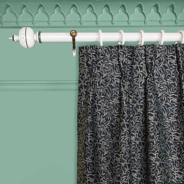 Noir curtain with dense silver-grey and olive leaf jacquard on a black ground