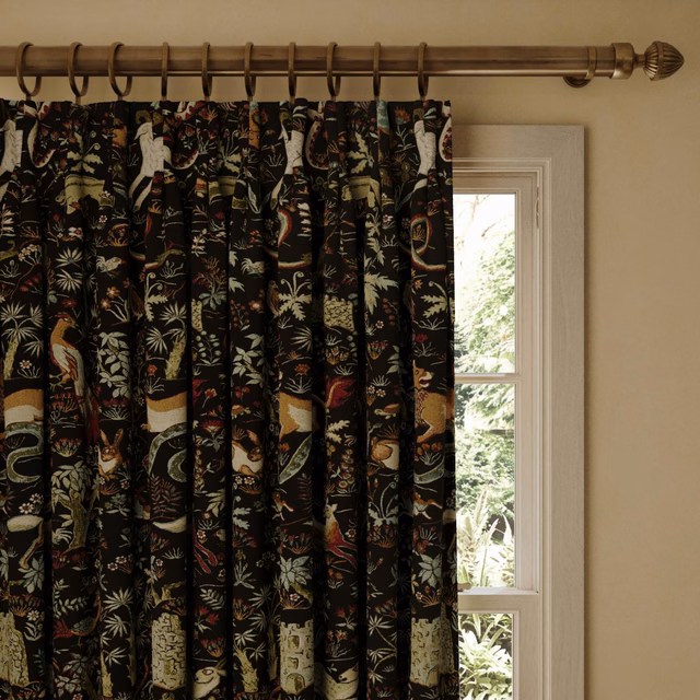 Onyx jacquard curtains with botanical motifs, animals and warm multicoloured details