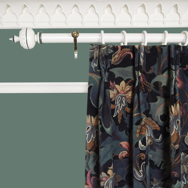 Dark teal velvet curtain with oversized rust, gold and blue botanical motifs