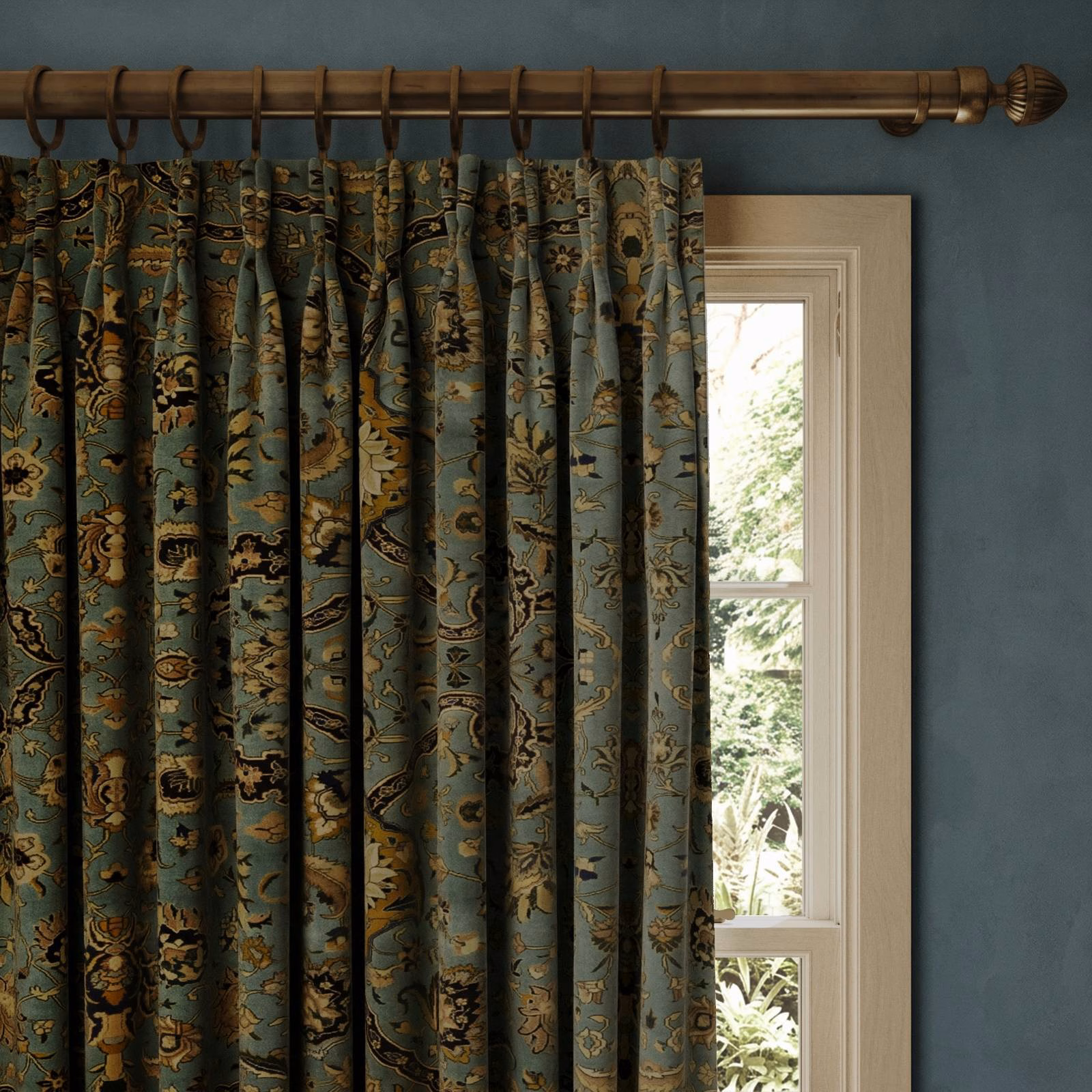 Deep sapphire velvet curtains with gold, olive and rust botanical motifs