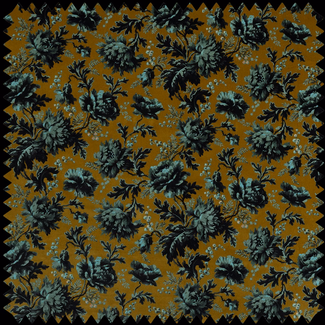 Ochre-bronze velvet with dark teal flowers and curling botanical stems