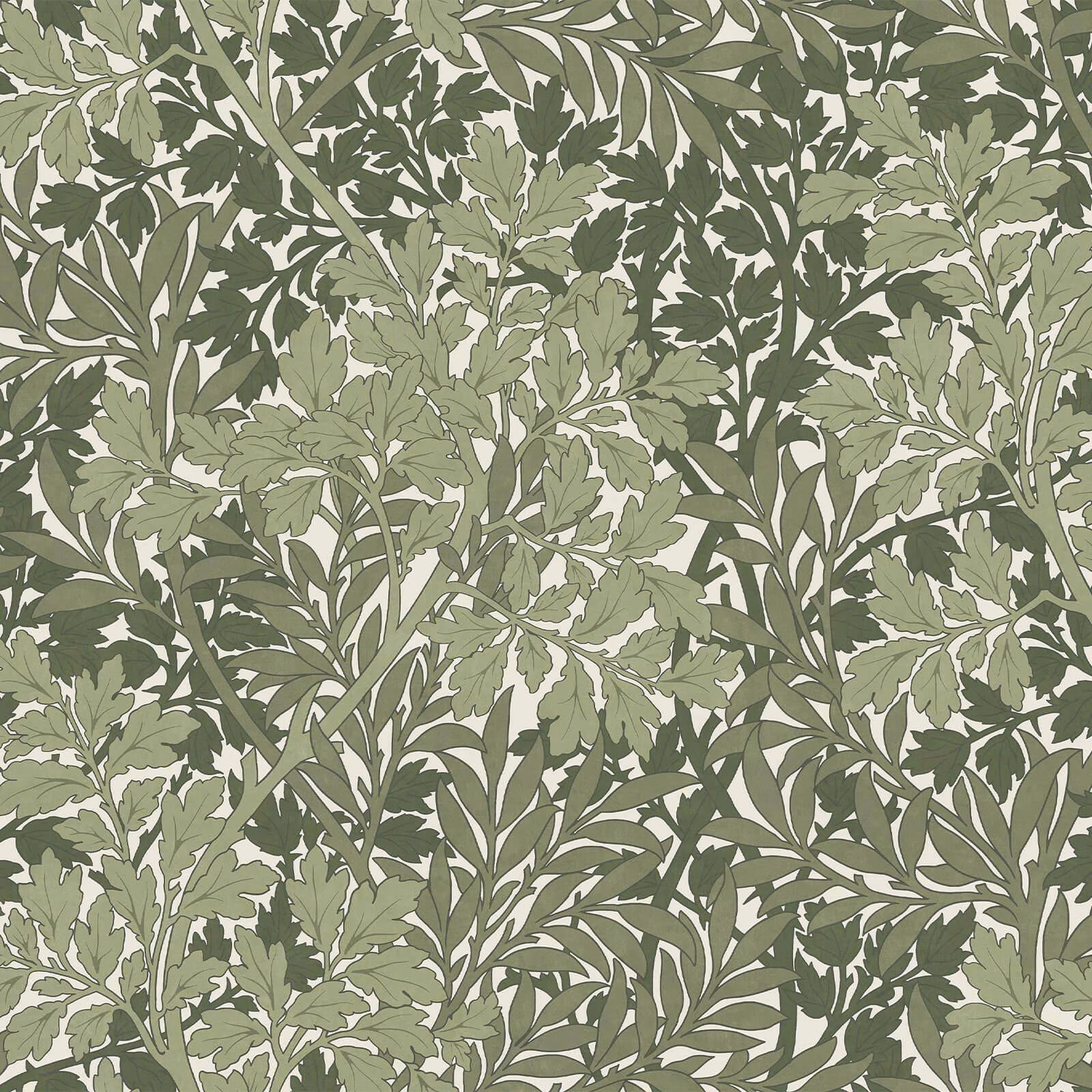 Dense sage and olive botanical foliage on a warm cream wallpaper ground