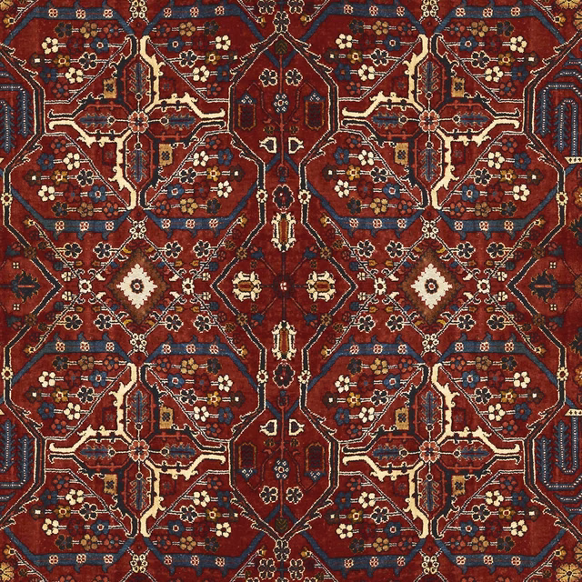 Sienna wallpaper with dense rust, burgundy, navy and cream geometric floral motifs