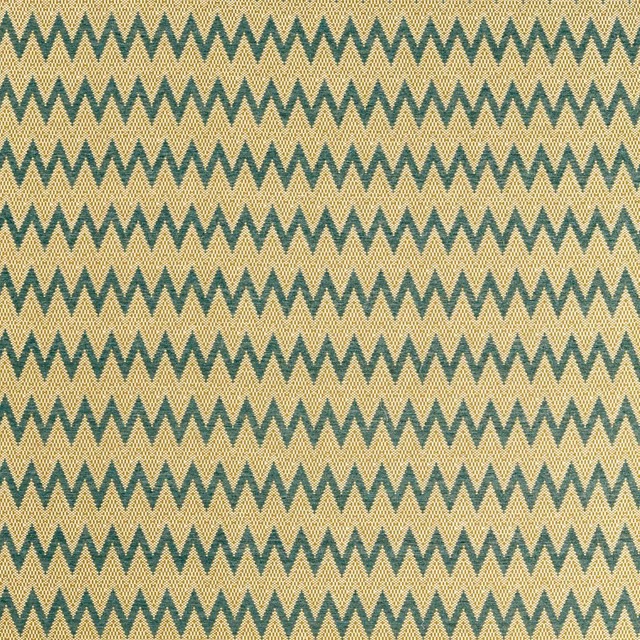 Pine-green and straw zigzags in a tightly textured woven close-up