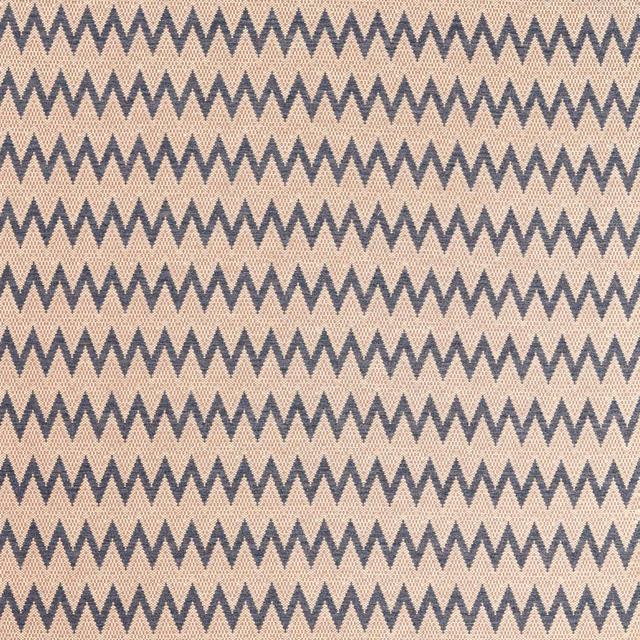 Muted blush-taupe woven ground with repeating storm-blue zigzag bands