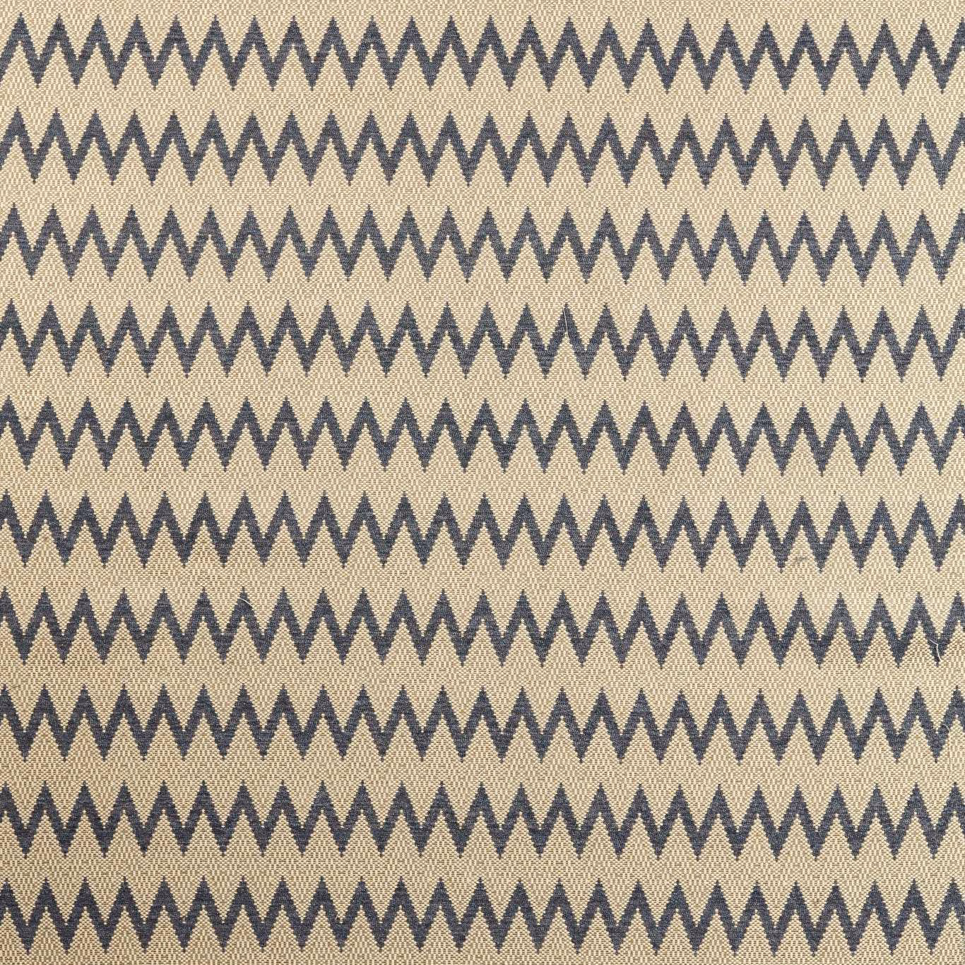 Storm-blue zigzags crossing a warm truffle-taupe woven ground
