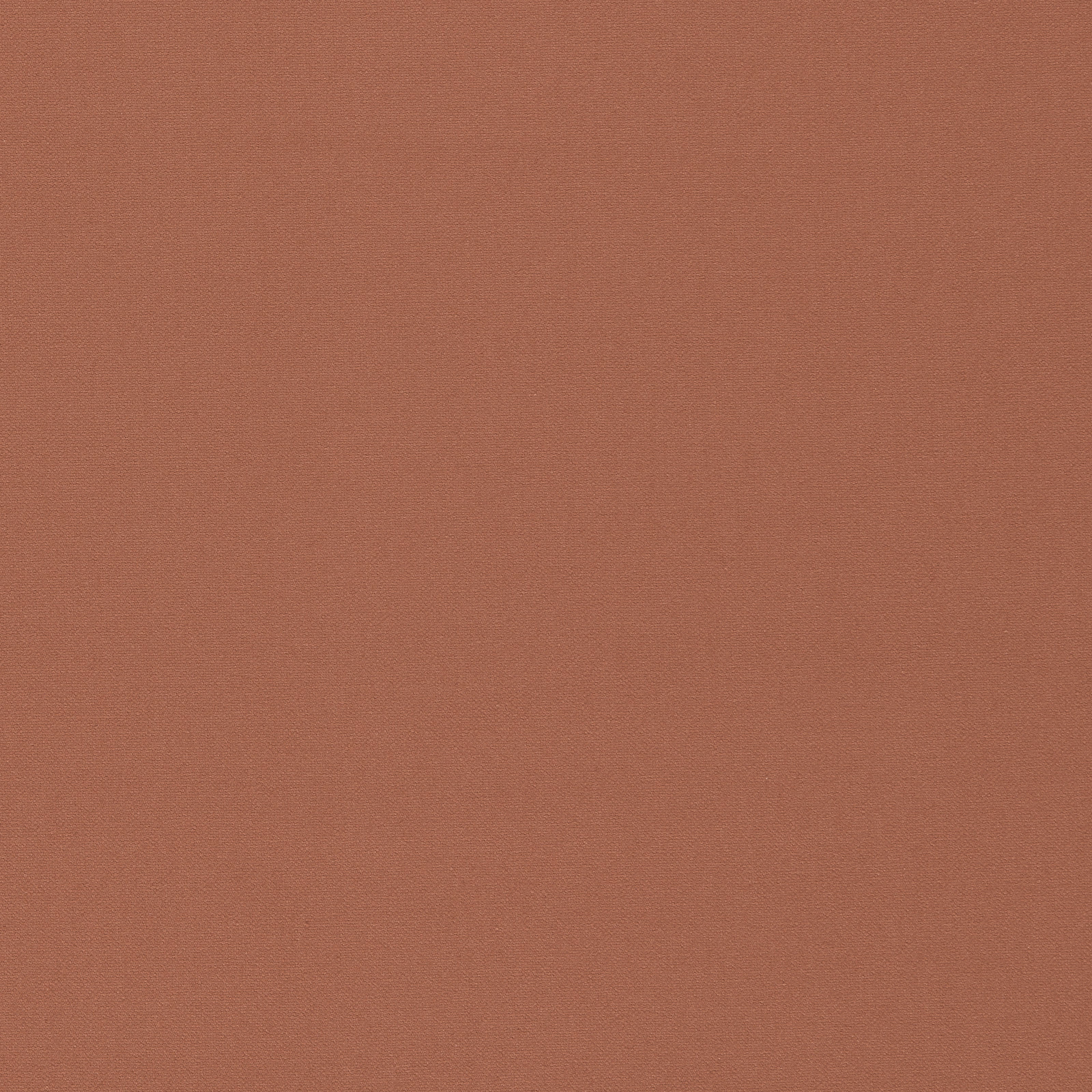 Dusty terracotta plain fabric with a fine, even woven texture