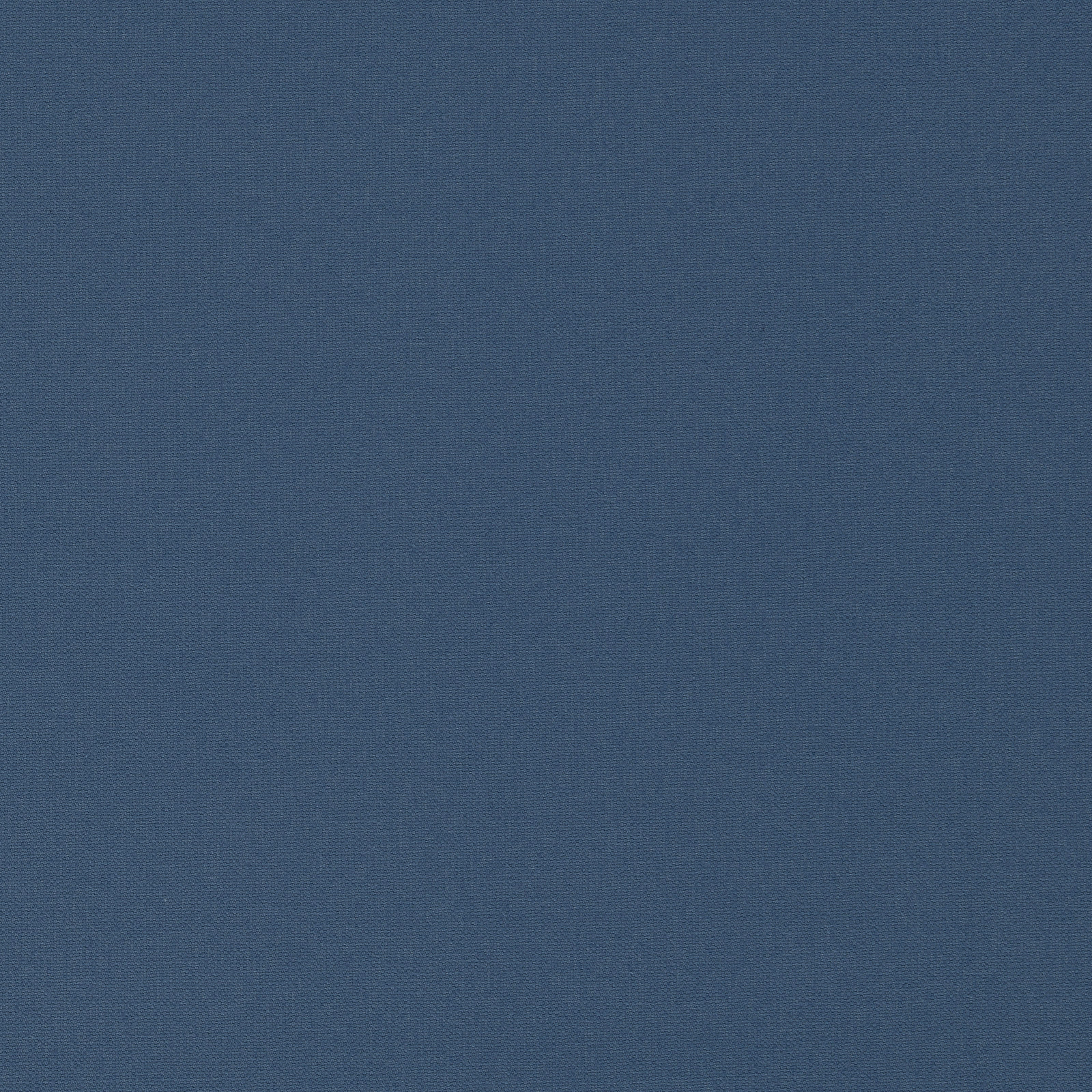 Close-up of cool denim-blue fabric with a fine, subtly textured woven surface