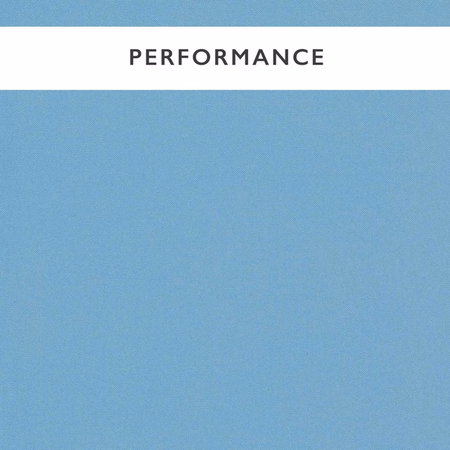 Close-up of cool powder-blue plain weave with a fine, even woven texture