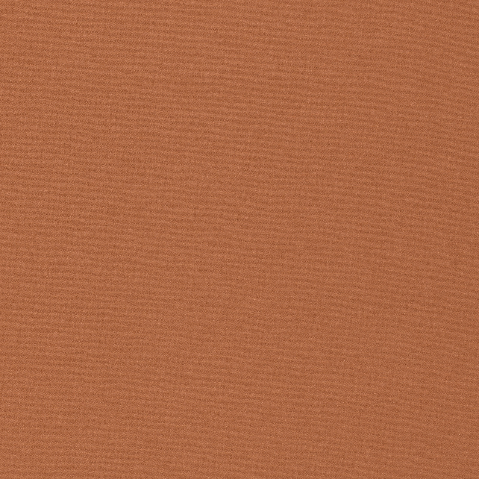 Close-up of warm rust terracotta fabric with a fine, even woven grain