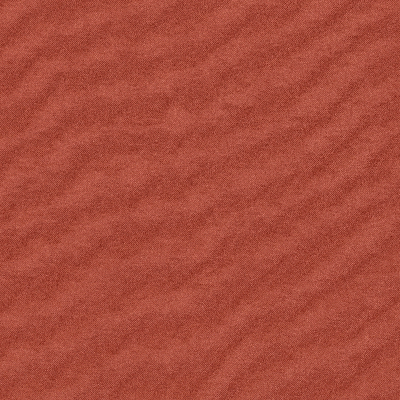 Close-up of deep scarlet red fabric with a fine, even woven texture