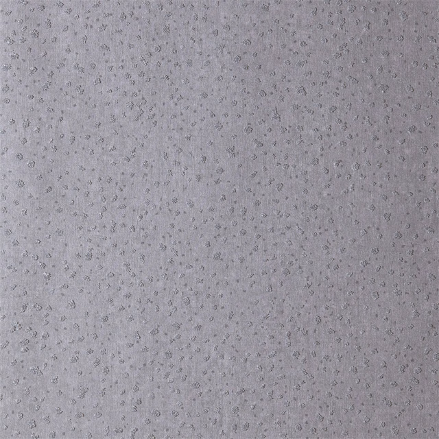 Greyed amethyst wallpaper with tiny tonal botanical flecks and a softly textured surface