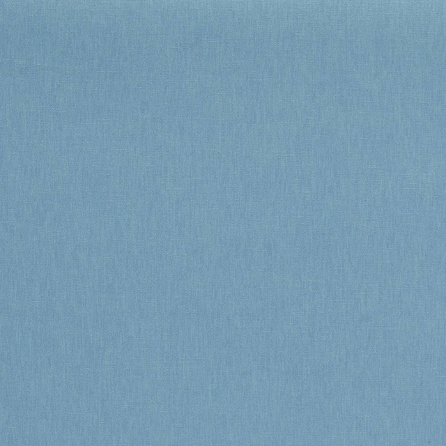 Muted dusty blue fabric showing a fine, softly vertical woven texture