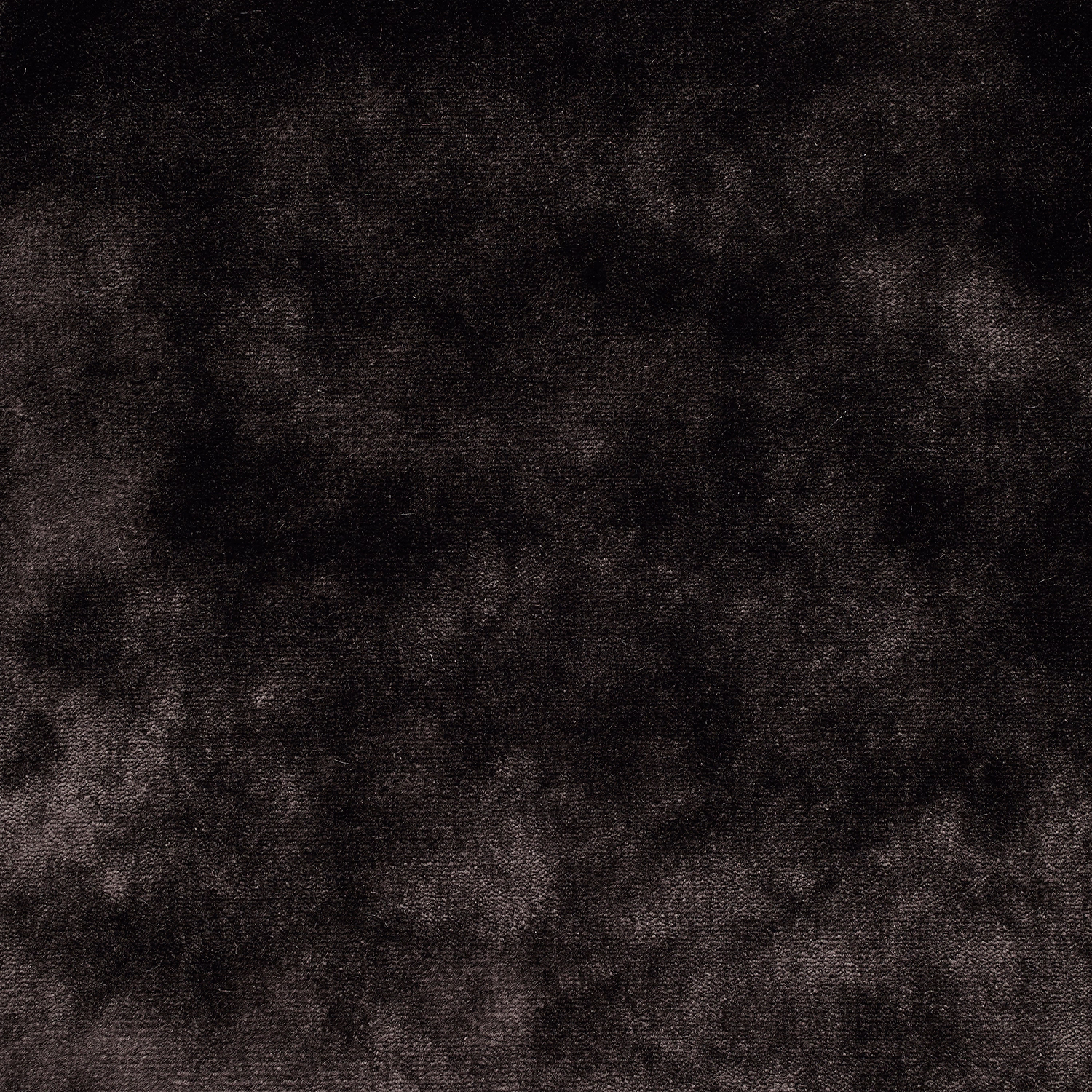 Smoky black velvet swatch with charcoal mottling and a softly textured pile