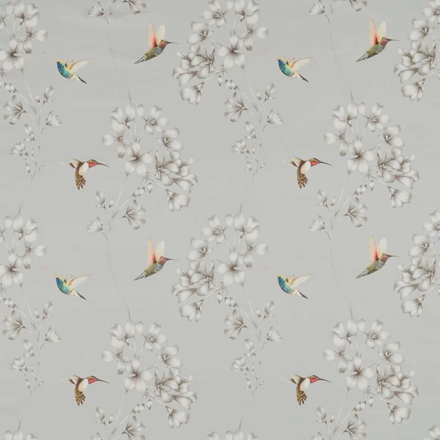 Cool French grey fabric with white blossom branches and jewel-toned hummingbirds