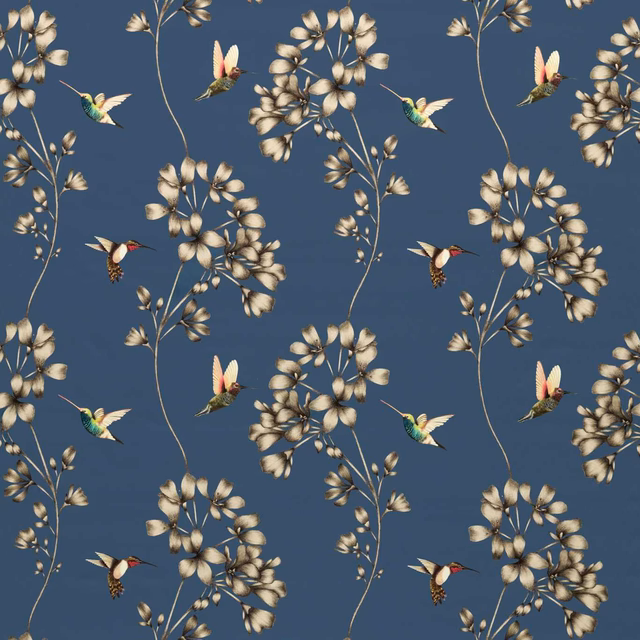 Indigo floral fabric with cream blossoms, hummingbirds and curling botanical stems