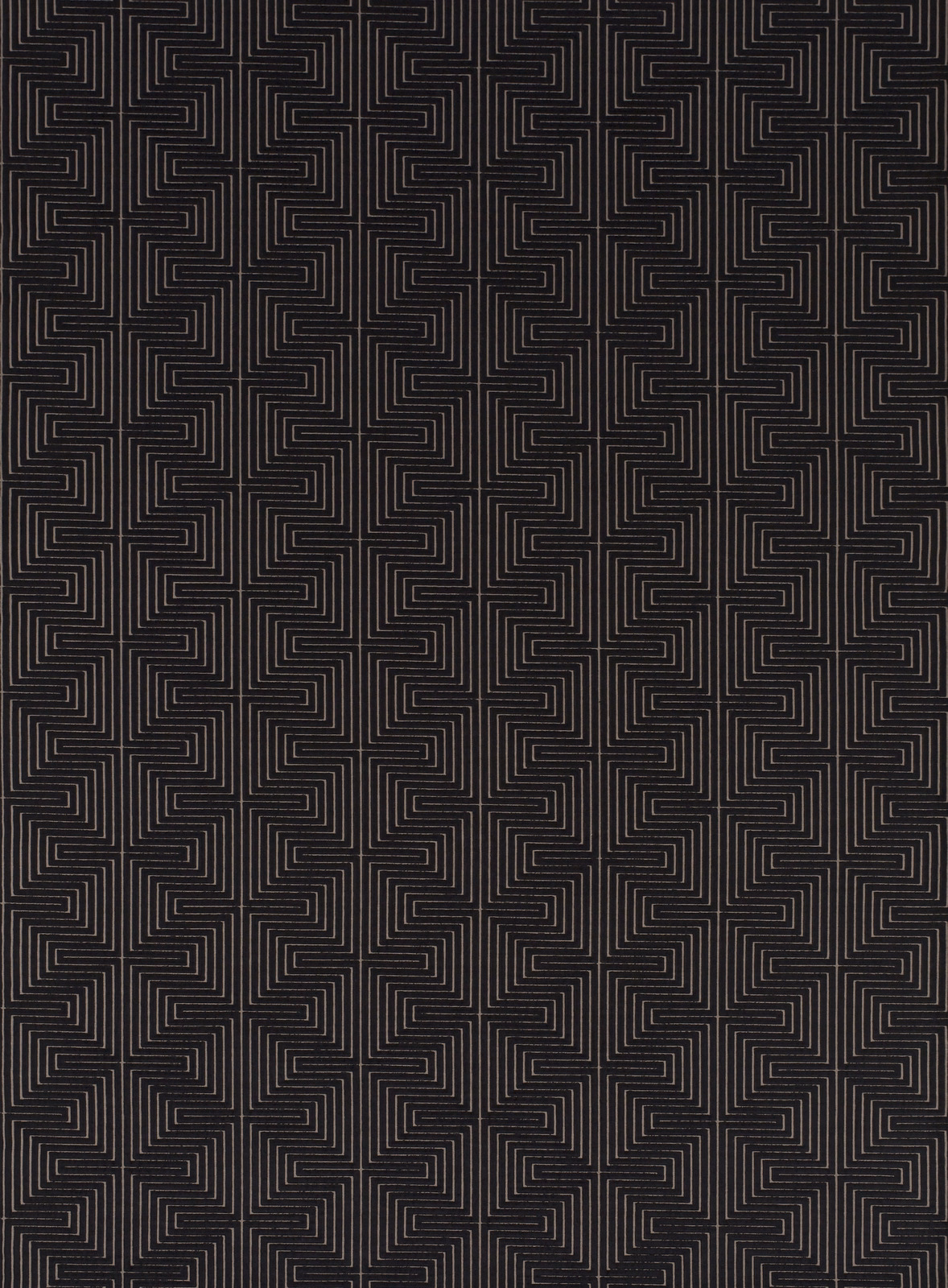 Charcoal-black woven fabric with fine maze-like geometric lines and subtle texture