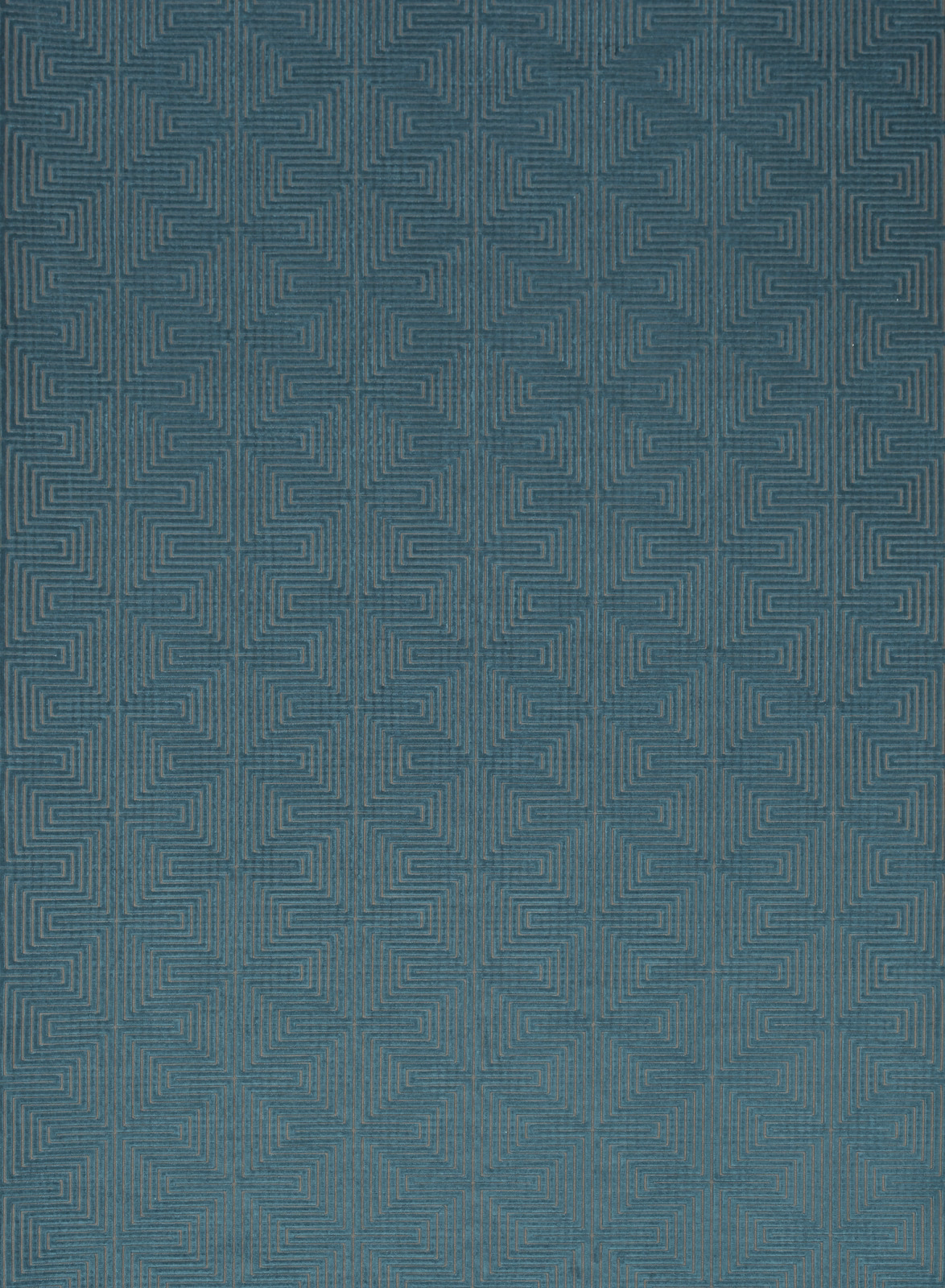 Storm-teal woven fabric with fine stepped maze motifs and subtle blue-grey tonal variation