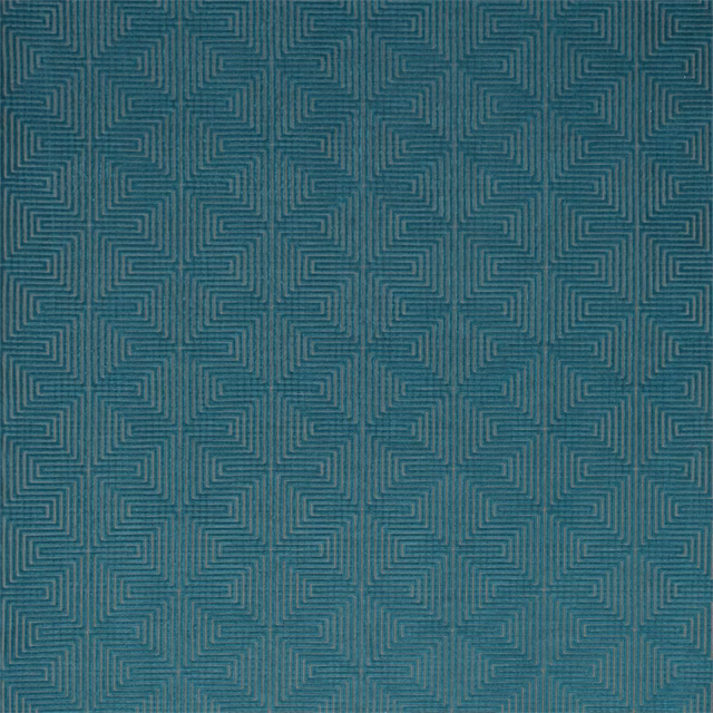 Storm-teal woven fabric with fine stepped maze motifs and subtle blue-grey tonal variation