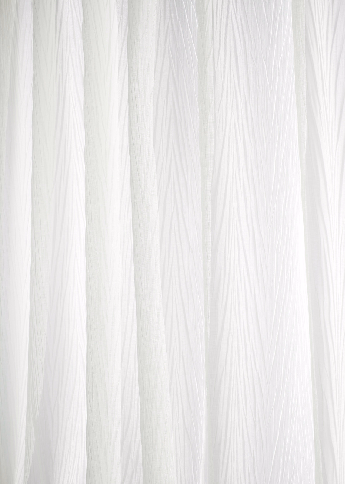 Soft ivory fabric with fine irregular vertical crinkle lines and gentle shadowed texture