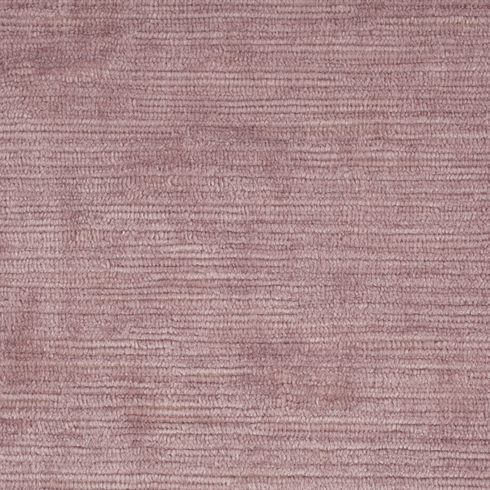 Dusty rose water velvet with softly rippled horizontal pile and gentle tonal variation