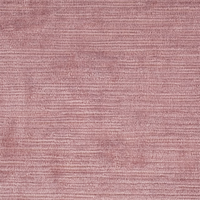 Dusty rose water velvet with softly rippled horizontal pile and gentle tonal variation