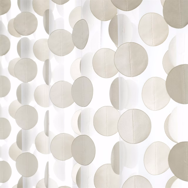 Pale champagne textile with translucent vertical bands and overlapping circular motifs